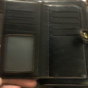 Really well made bag. Wallet key ring lots of.compartments